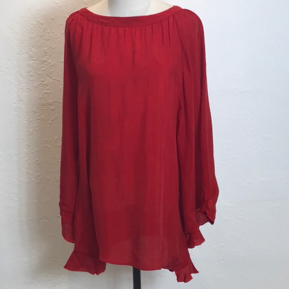 Poncho with ruffle